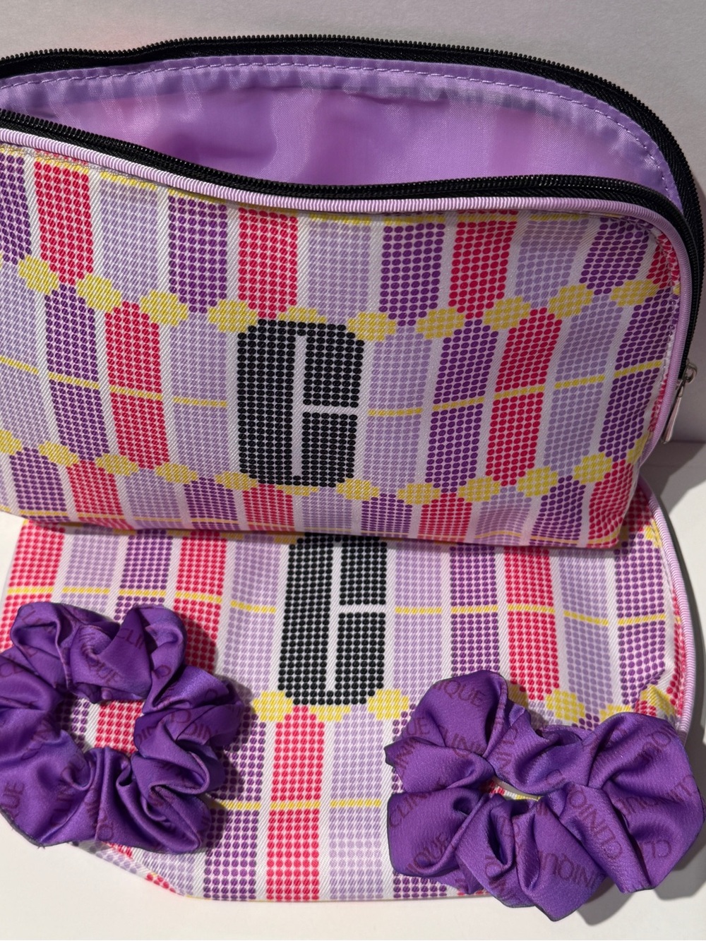 Clinique Pink Purple Yellow Patterned Cosmetic Bag with Purple Scrunchies